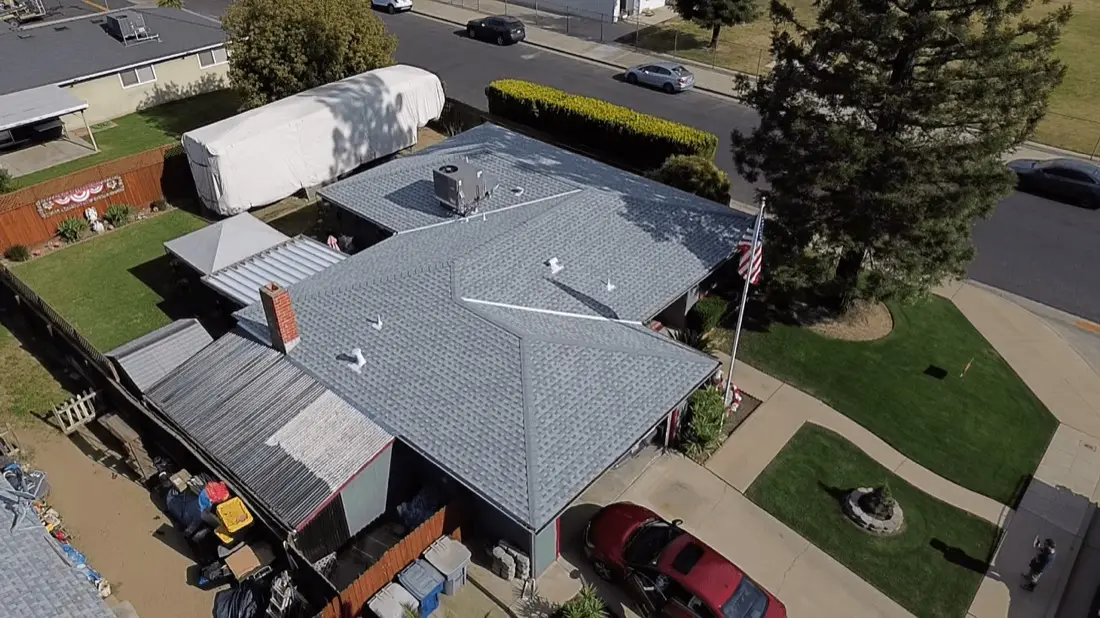 Aerial view of a completed CJM Roofing project