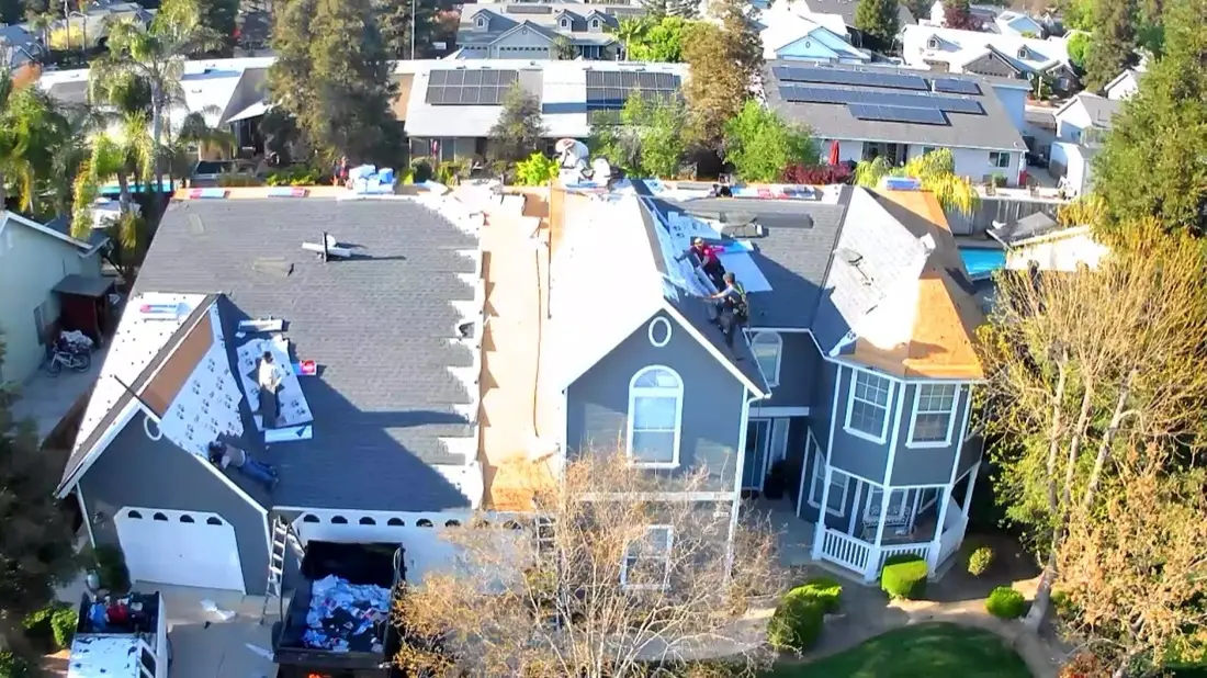 The CJM Roofing crew on a new roof installation in the Central Valley